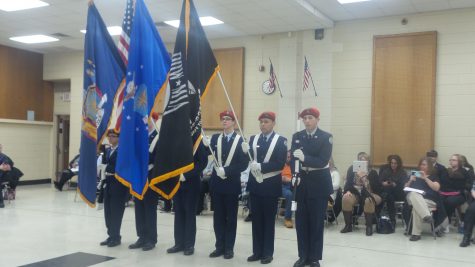 ROTC  students presenting the colors.