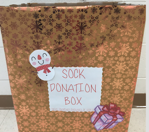 Sock donation box located in the main office of the high school.