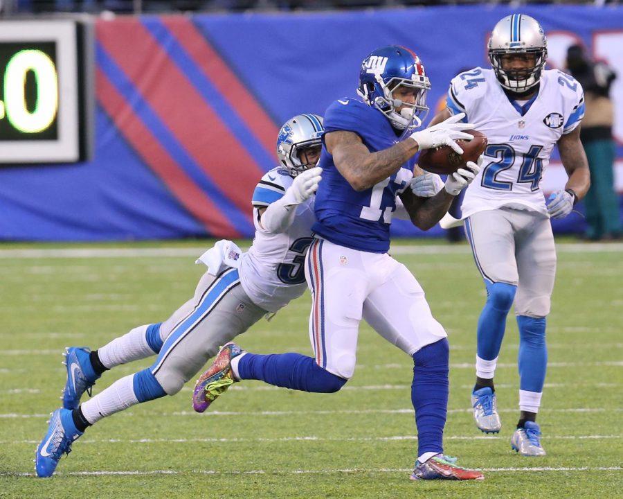 EAST RUTHERFORD, NJ --  December 18, 2016 --   New York Giants wide receiver Odell Beckham  Jr. (13) makes a catch against Detroit Lions defensive back Asa Jackson (30) and heads upfield during fourth quarter action at MetLife Stadium

Photo permission via Flickr Creative Commons