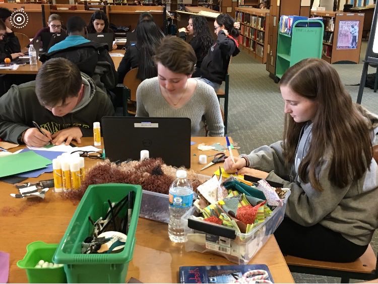 Sean Long, Camryn McGrath, and Karyn Waltz work on projects at Makerspaces.