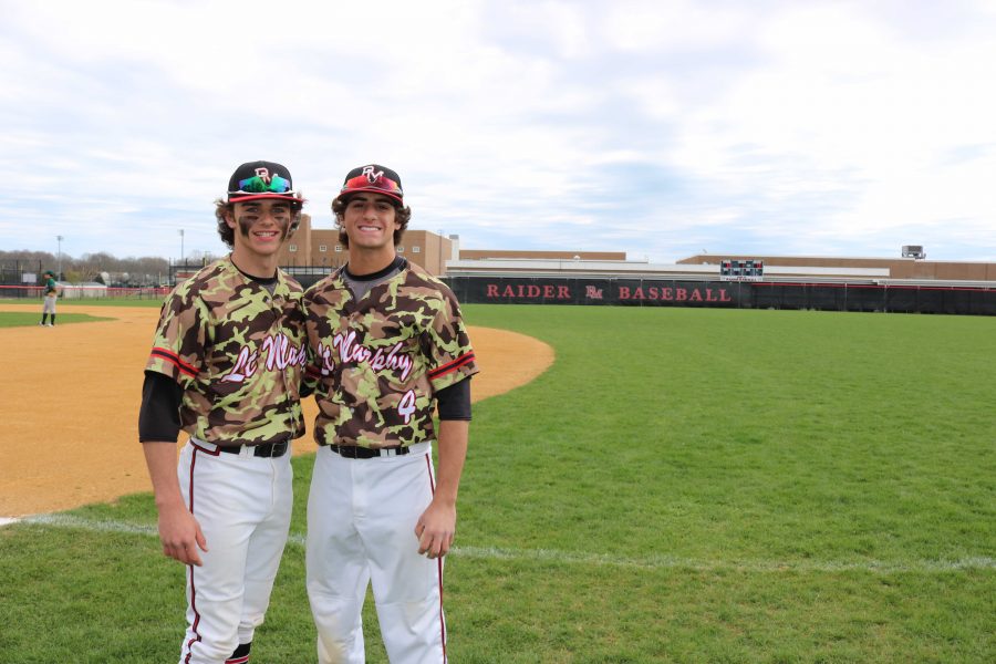 Seniors Erik Matz and Vito Morabito pose together in custom uniforms on the PMHS Baseball field. 