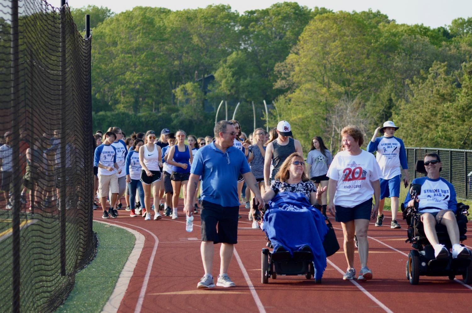 Participants begin the walk around the track at this years ALS: Ride for Life