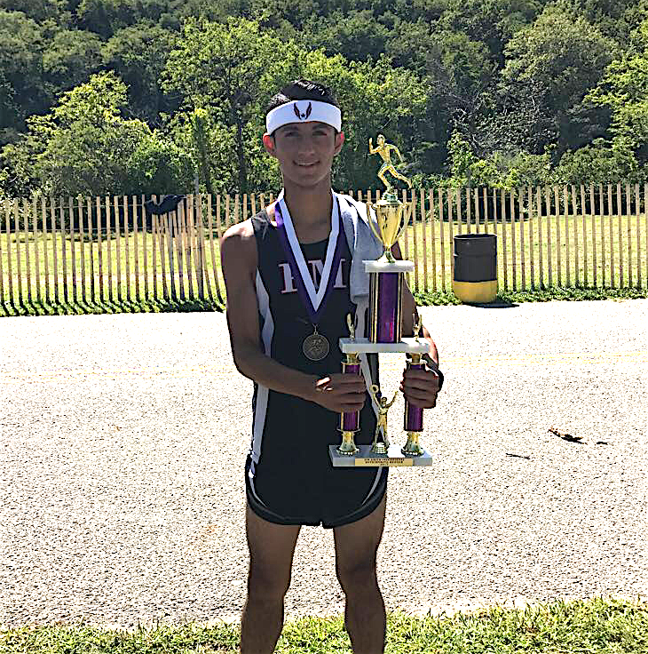 Santos at the Jim Smith invitational at Sunken Meadow State Park; ran a 17:10.51 5k and received trophy and medal for having the fastest run of the day.