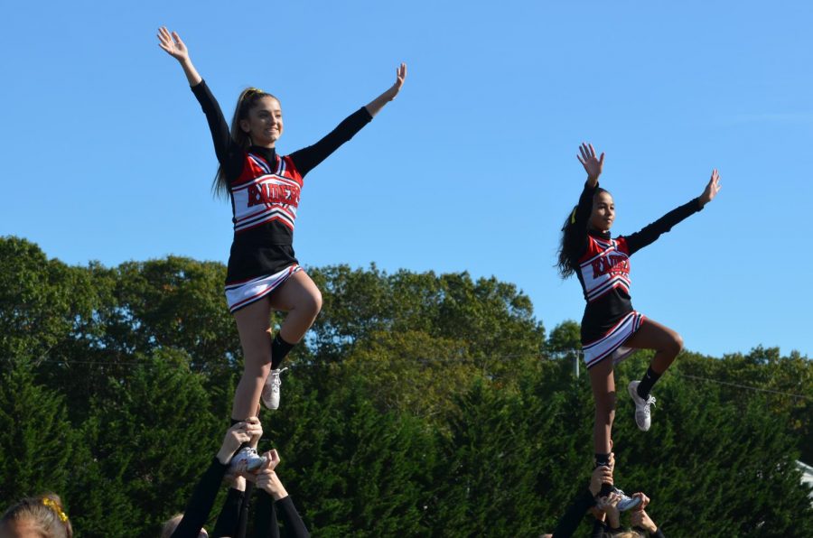PMHS cheerleaders performing during the football game.