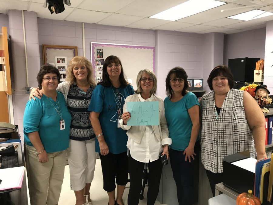 Members of PMHS staff wear teal to support trigeminal neuralgia awareness