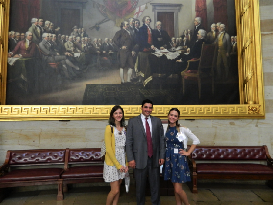 Brooke Shellman, Matthew Scott, and Julianna Ricca pictured in front of The Declaration of Independence painting by John Trumbull in the Capitol Building.