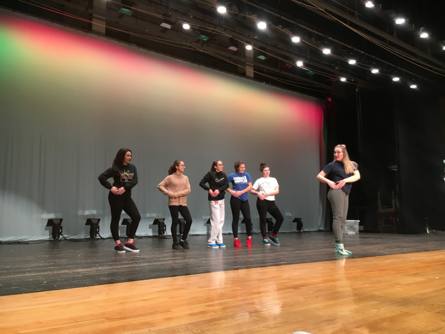 Students rehearse for school musical, The Little Mermaid.