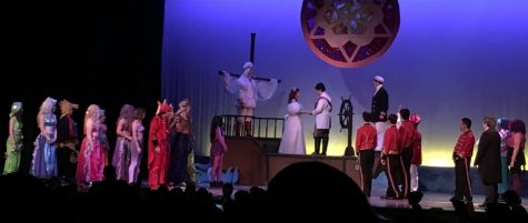 Pat-Med students on stage during the final scenes of The Little Mermaid. 