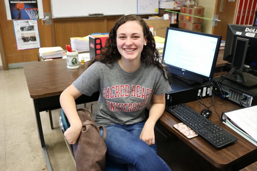 Emily poses in her Sacred Heart tee for Raider Decision Day! 