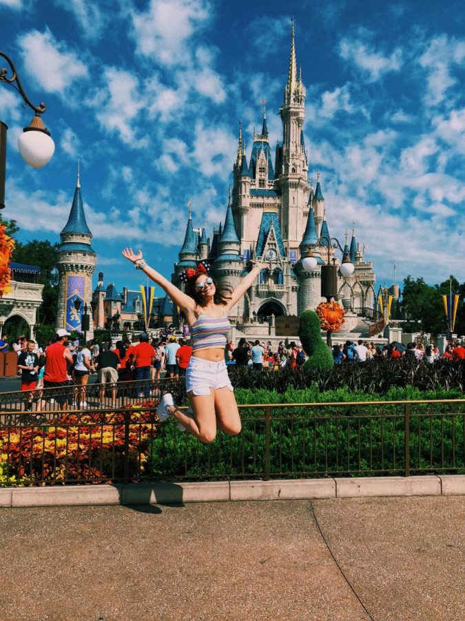 Jumping for joy. THIS is what it feels like when you have your first trip to Disney.