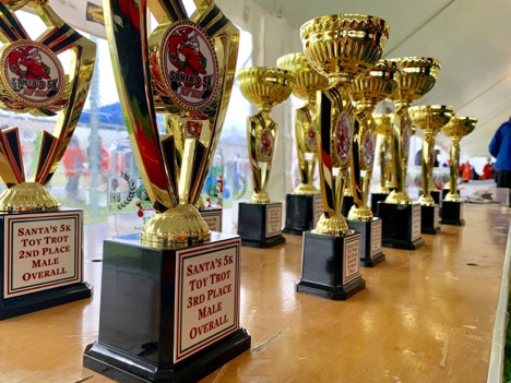 The trophies are laid out, waiting for the fastest runners to claim them. 
