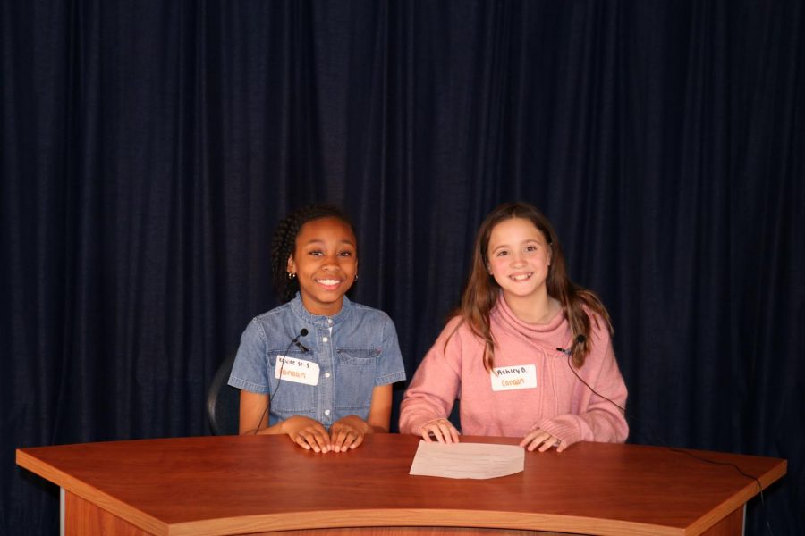 Kaylee and Ashley reporting from behind the desk for Raider TV! 