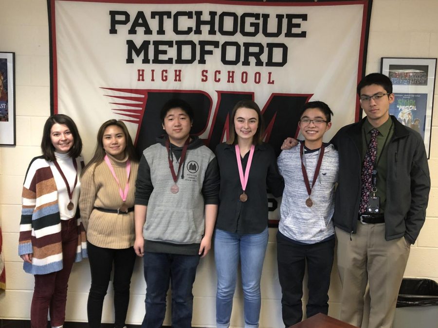 (From left to right) Elizabeth Niemiec, Francine Tongol, Evan Zhang, Meghan OLeary, and Justin Zhou. The Science Olympiad competition was on January 26th at Ward Melville High School.