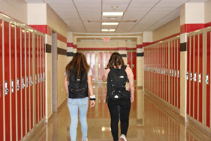 Freshmen students Savannah H. (right) and Ariana A. (left) navigating the halls of PMHS on their first day of high school.