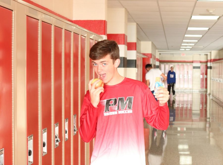 Junior, Adam Skarre, chooses healthy snacks options at school.