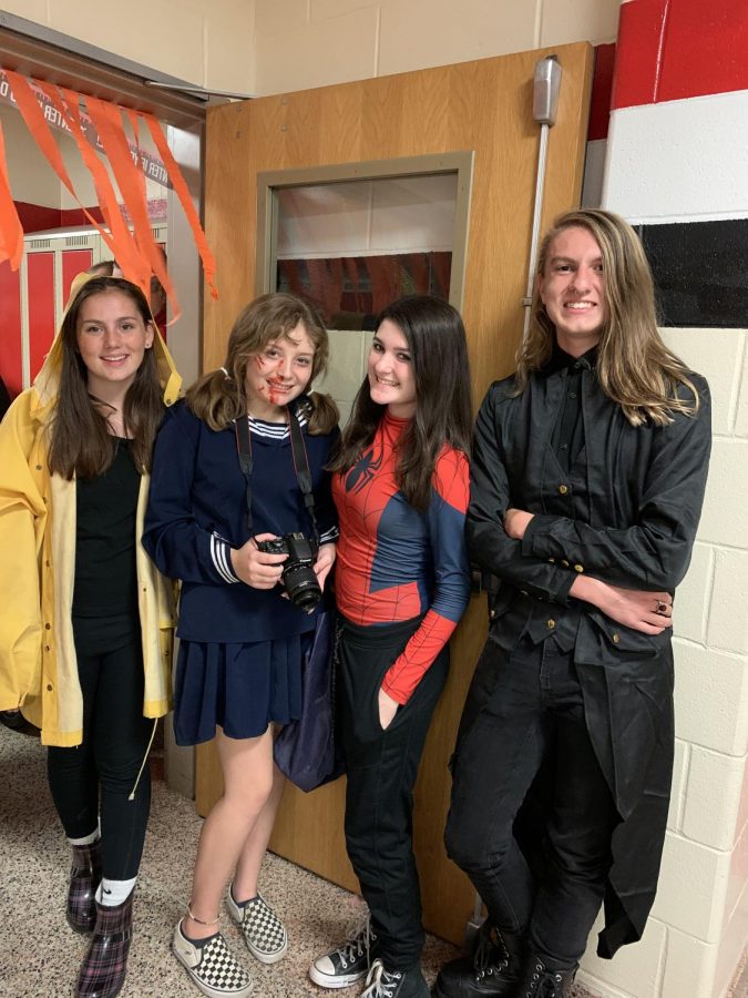 Sophomores Charolette Rooney dressed as Spider Girl, Gail Comiskey dressed as Gorgie from IT, Katereena Foltmann dressed as Robin from Stranger Things, and Jack Schaffer dressed as Hellraiser.