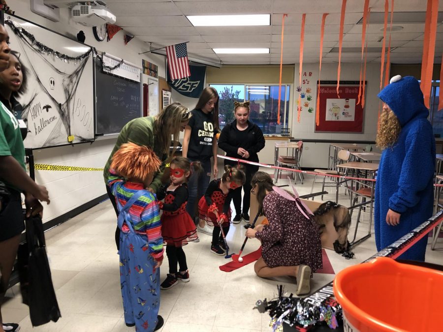 Younger students in our district dressed up, played games, and were rewarded with candy at PMHSs successful Trick or Treat Street.