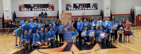 The girls basketball team representing PMHS in support of Dezy Strong Foundation. 