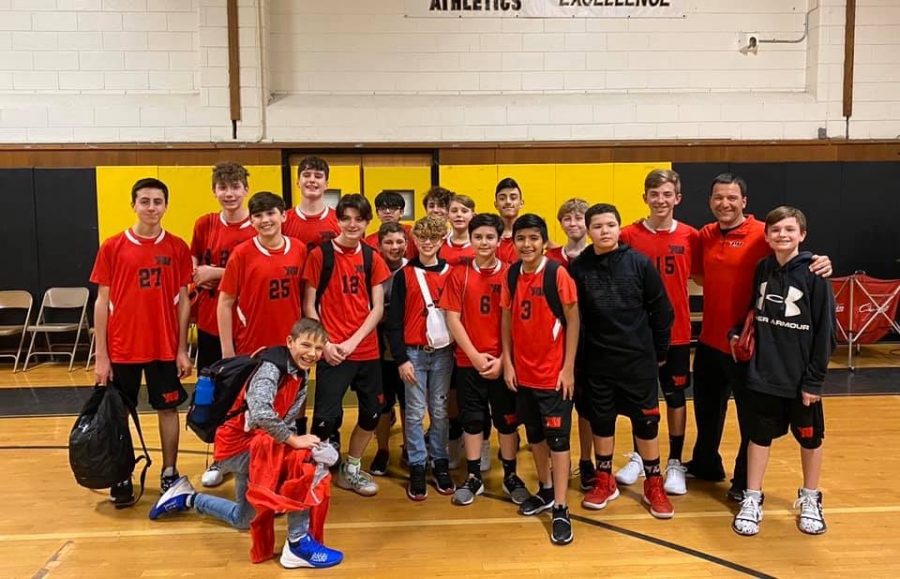 PMHS new boys volleyball team pose with their coach, Mr. Cuccinello. 