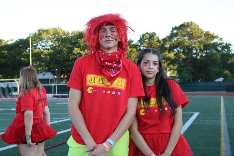 Jeraly Tejada and Julian Frey repping junior pride in class shirts and face paint.