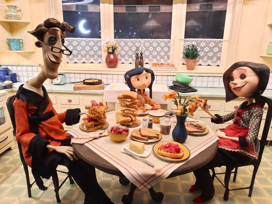 This display is a recreation of one of the scenes from the movie Coraline, where Coraline sits with her Other Mother and Other Father as they eat the breakfast of her dreams together. The attention to detail with everything from the food to the utensils in the background of the kitchen is astounding.  