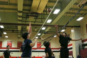 The annual NHS Volleyball tournament is a competitive night that invites teams of students, teachers, administrators, and alumni to participate. 