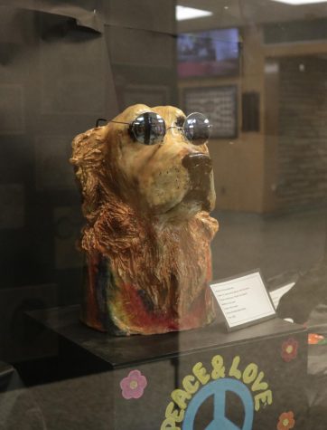 Kristina Mancuso created this tie-dye dog sculpture using elements of realism. 