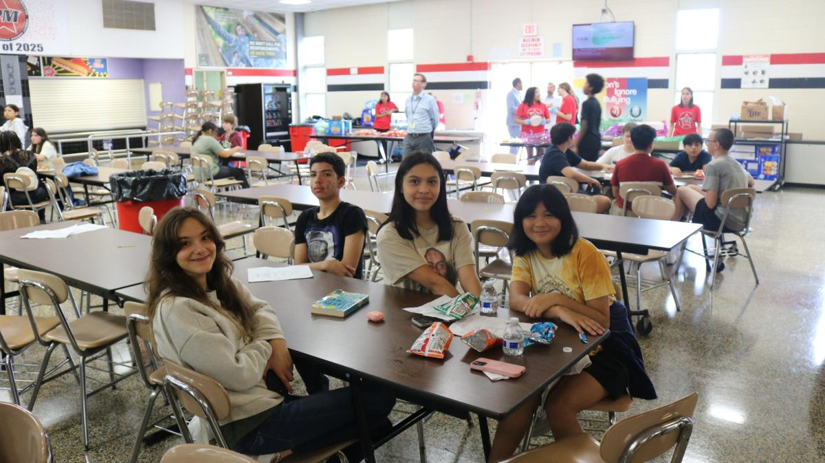 New students have a lunch break during the day in our high school cafeteria. 