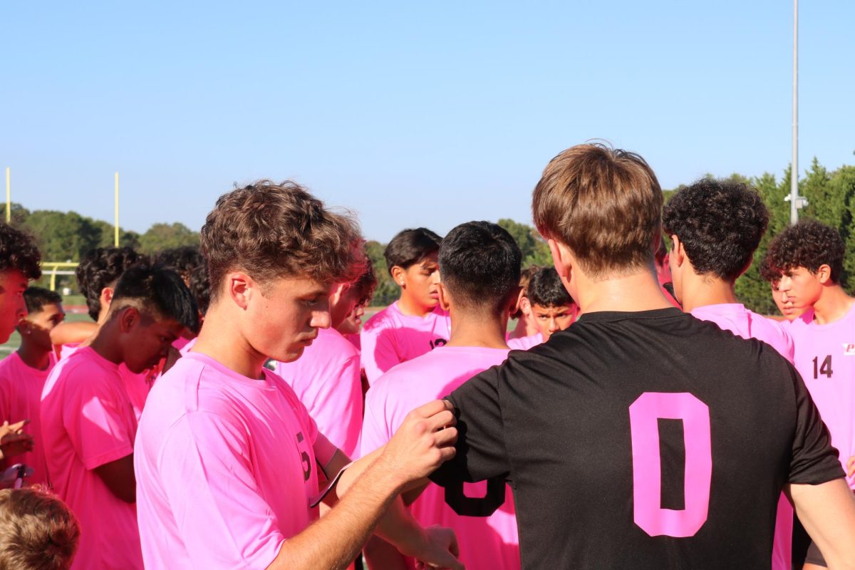 Senior night for Boys Varsity soccer including the team donning their pink jerseys to support Breast Cancer Awareness. 