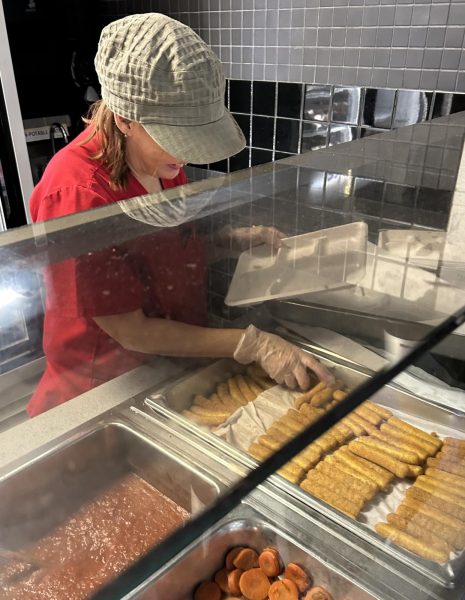 Mrs. Michelle serving up some hot mozzarella sticks during 8th period, the busiest of them all.