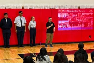 Cadets C/2Lt Jennifer Bruno, C/SrA Sydney Champlin, C/Amn Devanni Morabito-Smith, and C/2Lt Ryan Maravilla speak with middle school students about AFJROTC.