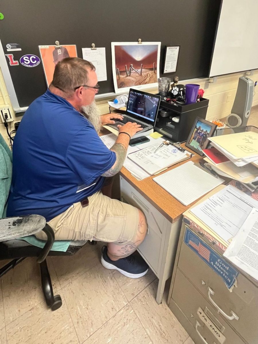 Mr. Varley preparing for his class.