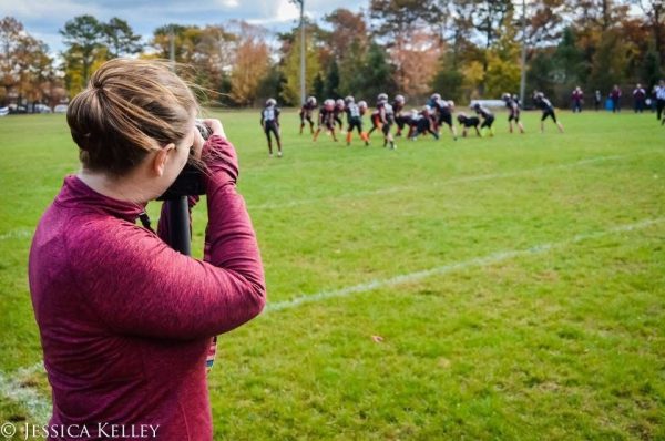 Jessica Kelley doing what she loves best, capturing the moments of action on and off the field.