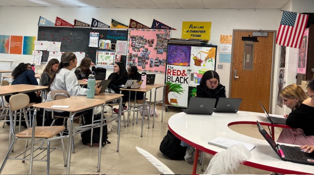 Journalism class preparing for broadcast. 