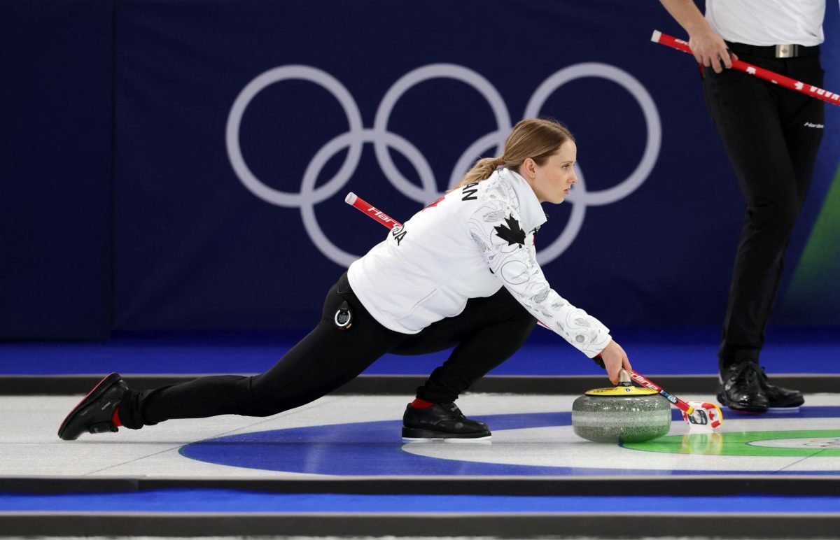 Milano Cortina 2026 Olympics - Curling - Mixed Doubles Round Robin Session 5 - United States of America vs Canada - Cortina Curling Olympic Stadium, Cortina d'Ampezzo, Italy - February 06, 2026. Jocelyn Peterman of Canada in action with Brett Gallant of Canada against Korey Dropkin of United States and Cory Thiesse of United States REUTERS/Issei Kato