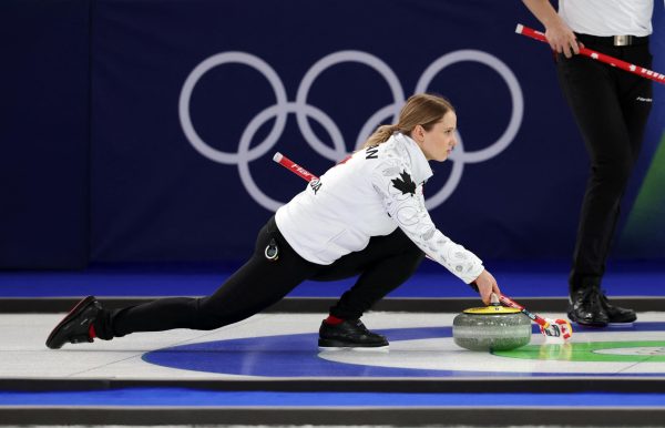 Milano Cortina 2026 Olympics - Curling - Mixed Doubles Round Robin Session 5 - United States of America vs Canada - Cortina Curling Olympic Stadium, Cortina d'Ampezzo, Italy - February 06, 2026. Jocelyn Peterman of Canada in action with Brett Gallant of Canada against Korey Dropkin of United States and Cory Thiesse of United States REUTERS/Issei Kato